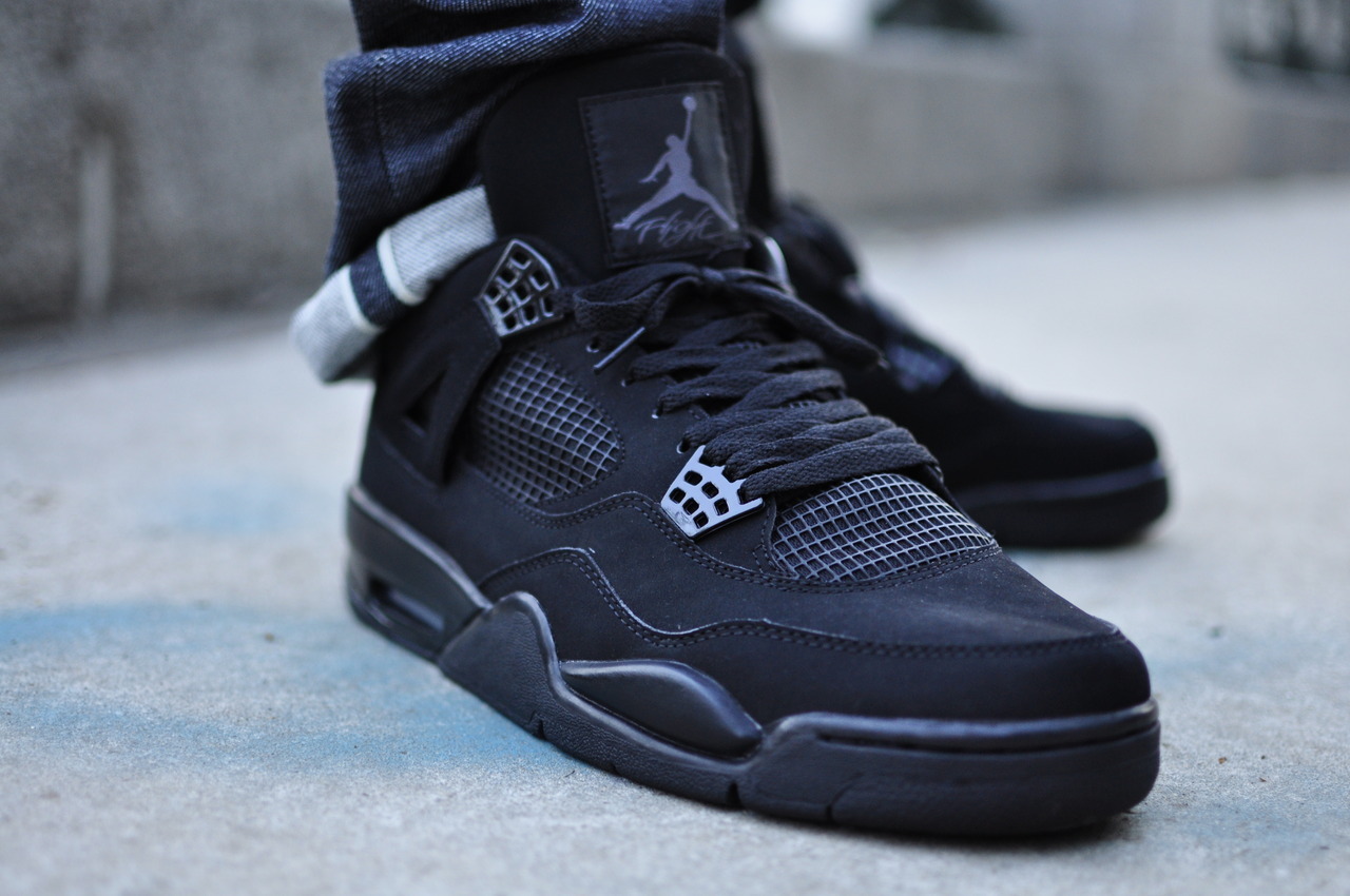 jordan 4 black cat on feet