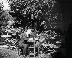  France, c. 1925 — F. Scott Fitzgerald is filmed writing. 