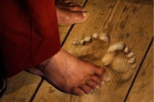 stawh:   70 year-old Buddhist monk Hua Chi has been praying in the same spot at his temple in Tongren, China for over 20 years. His footprints, which are up to 1.2 inches deep in some areas, are the result of performing his prayers up to 3000 times a