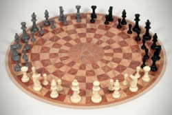 completelyoriginaltitle:  caong:  zeaky:  blackaperture:  Three-person chess.[via]  This can only end in tears and physical fighting  One of my housemates has one of these. The above person was correct.   where can I get one of these?