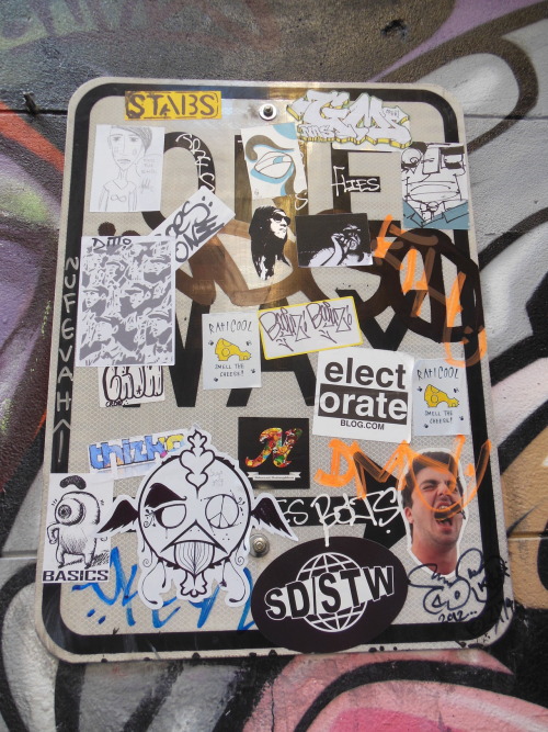 ir0nlaks:  snappingthewalls:  sticker way  INDGO tag behind all the stickers.  http://electorateblog.com/ 