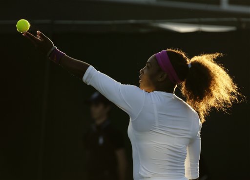 Serena Williams by The Associated Press She looks like a goddess here – a bit frizzy,