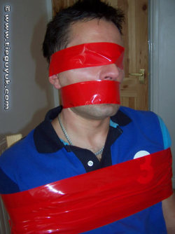 leatherfreak85:  Hell yeah…..I wish someone would tape up my whole head like this. gaybdsmbreathcontrol:  RAWR  