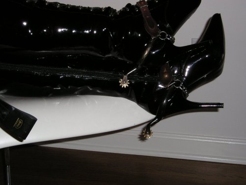 XXX with-spurs-femdom 57606341550 photo