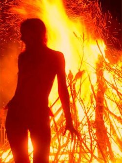 blessedonebe:  Woman near a ceremonial Fire ! —&gt; Awesome picture, many thanks to the Wicca Radio ! # Magick on the air # *)O(* 