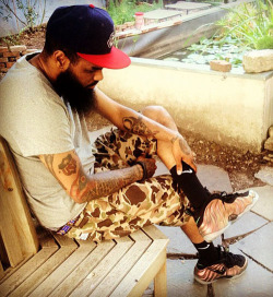 uniquelyrawstyle:  Stalley in the Nike Air Foamposite Pro “Gym Green” 
