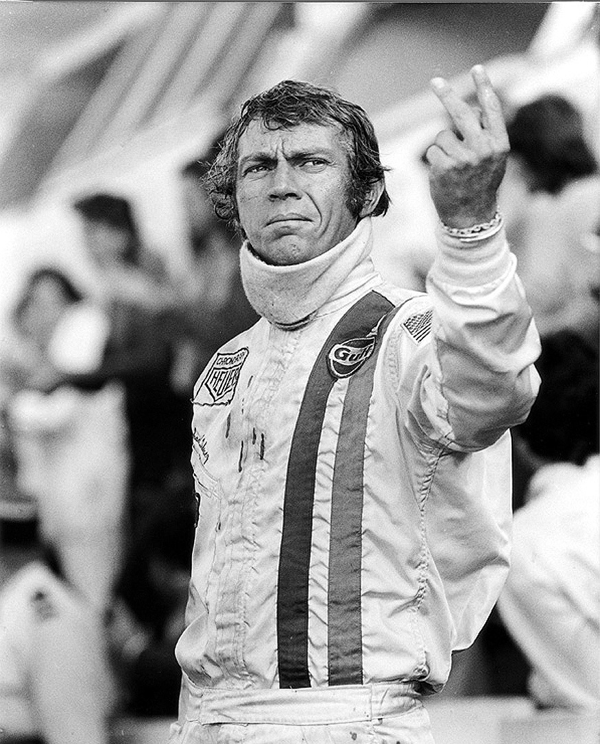 sharonov:  Steve McQueen finger salute in Le Mans This gesture is English in origin.