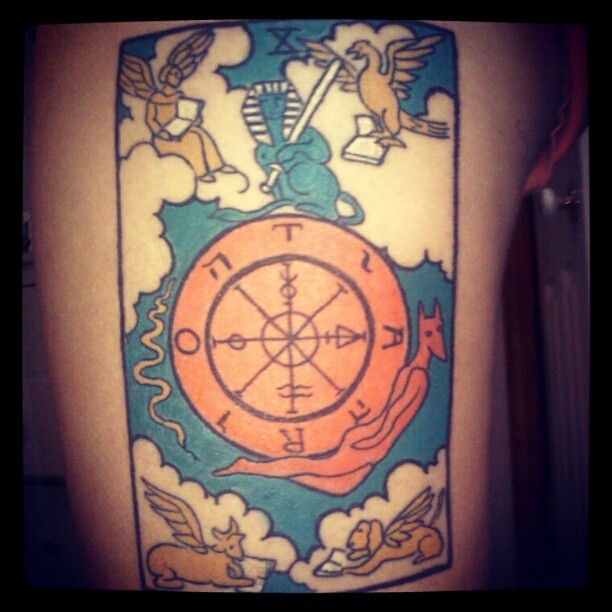 Wheel of Fortune Tarot Card tattoo. Done at Planet NY Tattoo in Poughkeepsie, NY