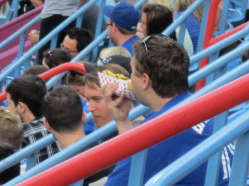 grownmeneatinghotdogs:A grown man in the 500s at the Rogers Centre in Toronto was caught eating a fo