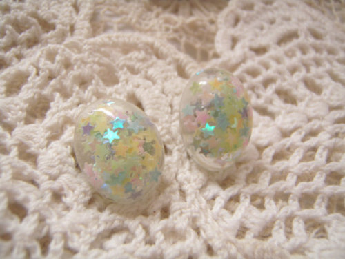 Remind yourself of space aliens with these pastel star earrings. Available at https://www.etsy.com/l