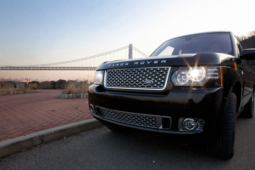 landroverusa:  Bright Lights The bright car beam matches the bright lights of the looming city.