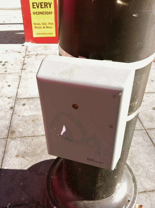 I was on the way to a meeting yesterday when I walked right past this little grey box strapped to a light pole, at about knee level. I did a double take after thinking to myself “that thing looks like it’s designed to attract as little attention as...