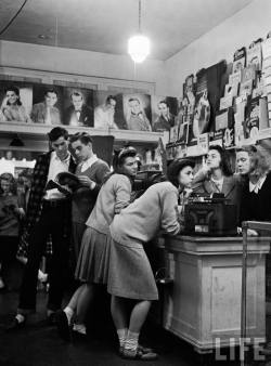 lostsplendor:  “Group of teenagers listening to 45 rpm. records as they shop for the latest hits at a record store.” Mississippi, 1944  (LIFE) 