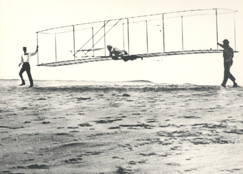 The Wright brothers’ third test glider being launched at Kill Devil Hills, North Carolina, on 