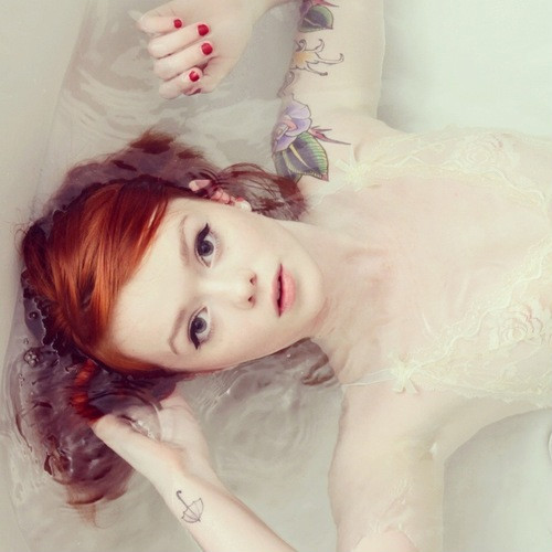 Wet redhead beauty.