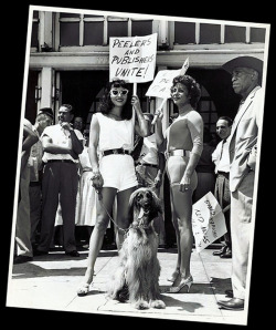 Novita (wearing sunglasses) marches the picket