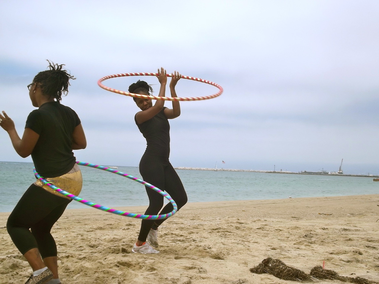 so instead of going to the gym, my sister and i went to the beach and hooped for