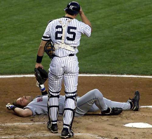 BACK IN THE DAY |7/8/00| Roger Clemens hits Mike Piazza in the head with a pitch, in the second game of the Mets/Yankees double-ballpark doubleheader.