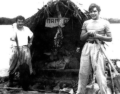 Alberto Granado and Guevara aboard their “Mambo-Tango” wooden raft on the Amazon River. 