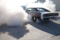 frankkozik:   THE BIG BLACK DODGE This is my car. It is a 1969 Dodge Charger R/T. It has a modified 440 RB engine which produces 494 RWHP. It has an 18 spline a833 manual 4 -speed transmission with 4.56 ratio gears. It has a modified suspension and chassi