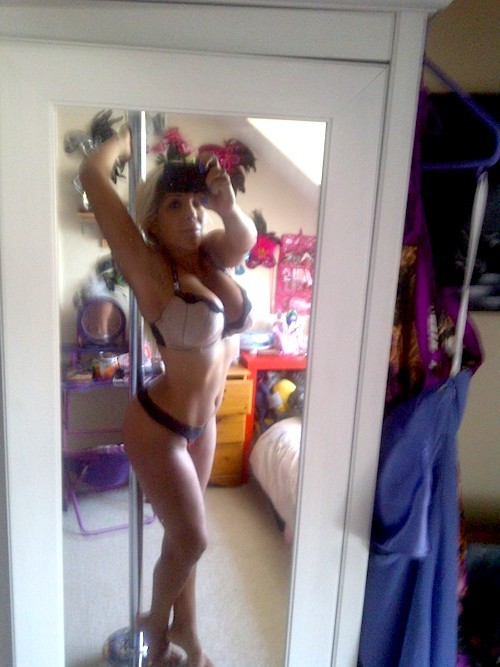 showmeyouriphone:  Busty Tia Lolita iPhone self shot against her stripper pole.