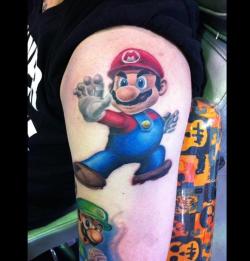 fuckyeahtattoos:  Mario! A part of my Super Mario Brothers half