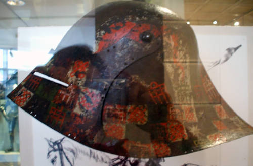 Two examples of painted black sallets. These helms were usually bought from the armorer with a &ldqu