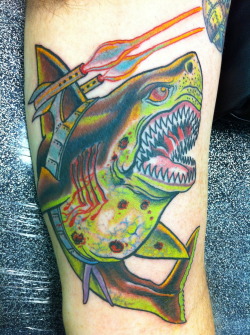 fuckyeahtattoos:  I did this on a client of mine that seems to believe that the world is going to be taken over by land sharks with lasers…   But asked me to do it a bit more literal.  So here we are  ….Laser Shark by Mark VanNess @ Oak City Tattoo