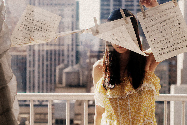 spatiale:  girl and music sheets by jpc79 on Flickr. 