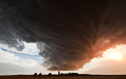 politics-war:  A massive storm cloud twists