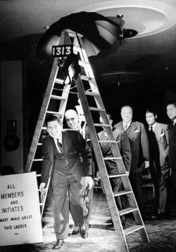 vintagegal:     Happy Friday the 13th! Members of the anti-superstition party walking underneath a ladder.Chicago, IL, 1940  