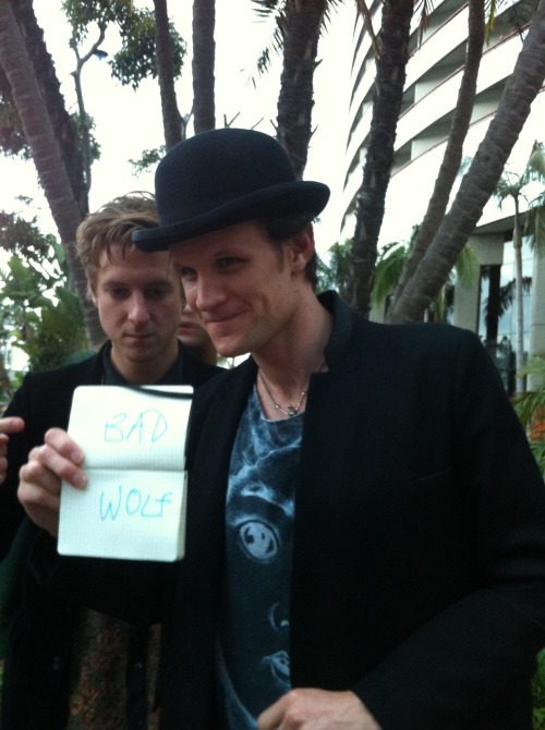itsdoctorfuckinwho:  allrightfine:  Round 2 of running across the Doctor Who cast at Comic-Con. Or, alternate title: this time I am going to write BAD WOLF on a sign and that is as far as my thought process is going to go. Hat-tip to my coworkers, who