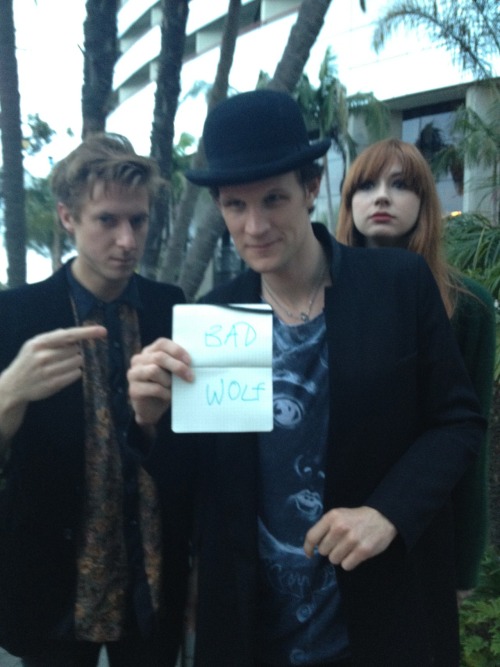 itsdoctorfuckinwho:  allrightfine:  Round 2 of running across the Doctor Who cast at Comic-Con. Or, alternate title: this time I am going to write BAD WOLF on a sign and that is as far as my thought process is going to go. Hat-tip to my coworkers, who