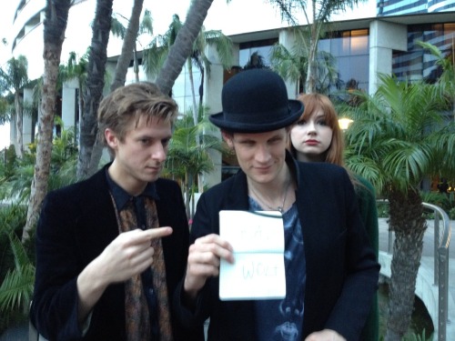 itsdoctorfuckinwho:  allrightfine:  Round 2 of running across the Doctor Who cast at Comic-Con. Or, alternate title: this time I am going to write BAD WOLF on a sign and that is as far as my thought process is going to go. Hat-tip to my coworkers, who