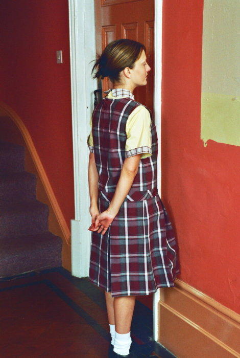 schoolgirldiscipline: Outside the study, the girl waits for the door to open, and to be summoned in.