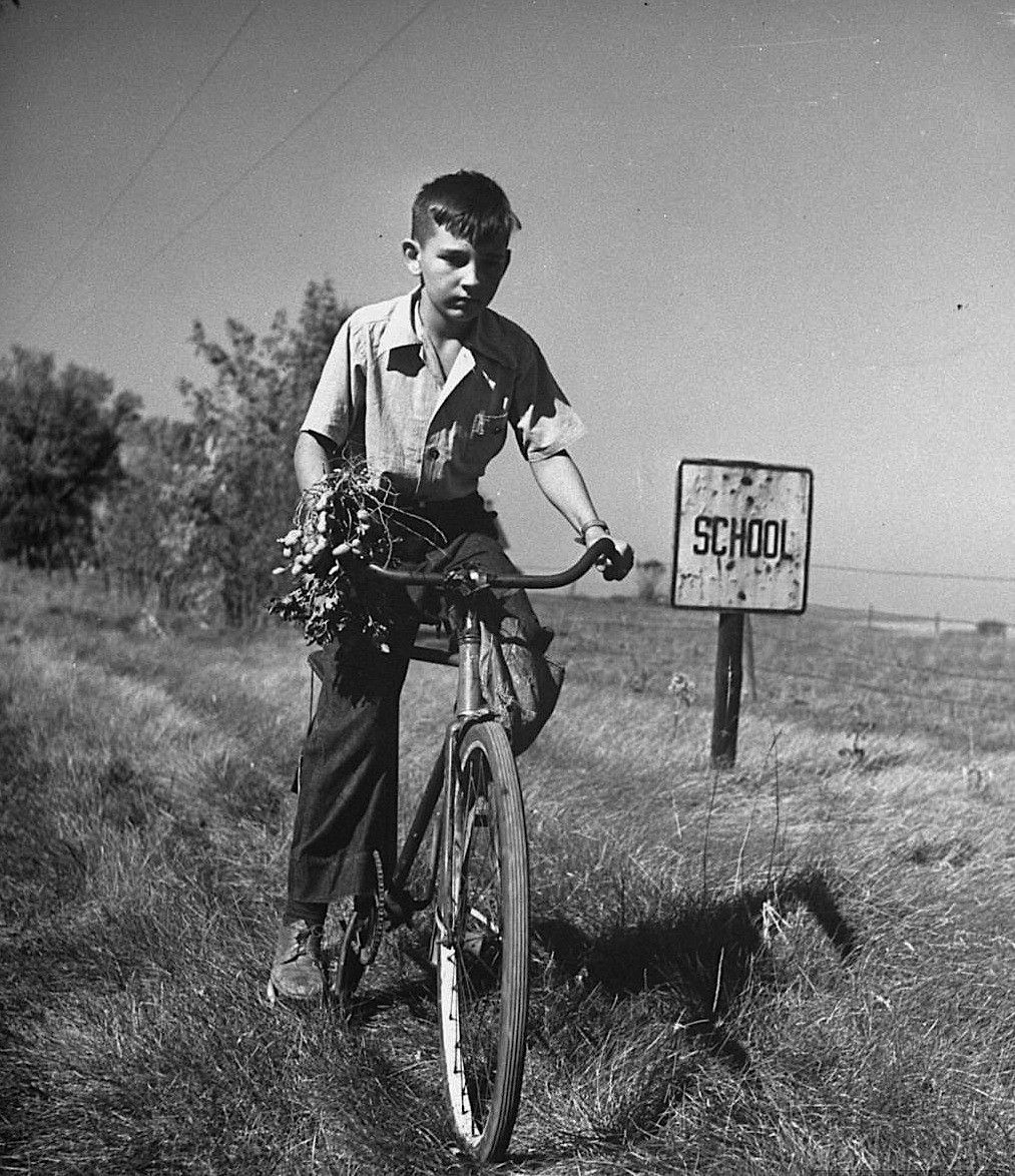 Bernard Hoffman
A boy riding his bicycle to school, Illinois, USA, 1946