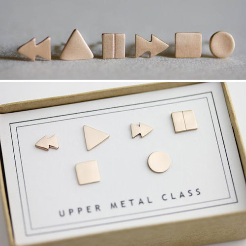 Looking for a new geek chic accessory this summer?
We’re head over heels for these Control Earrings by Upper Metal Class and are pumped to be giving two sets away. Contest details here!