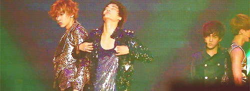 jonginnies:  Kai shaking his clothes and Chanyeol trying to copy him 