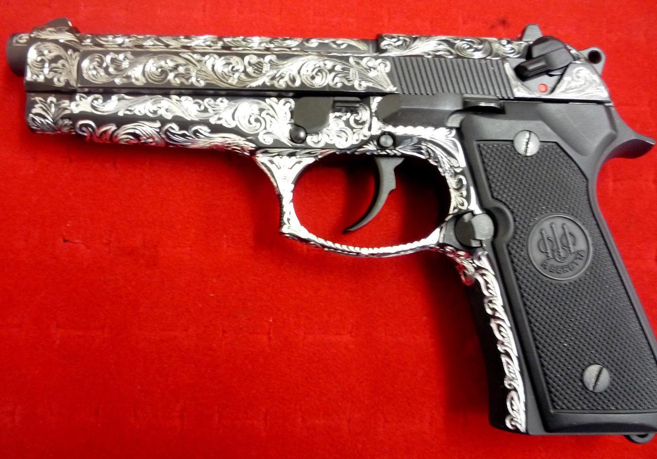 pimpingweapons:  Engraved Beretta 92; the same engraver apparently does hubcaps.