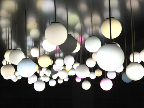 strle:  Close up of the gorgeous light fixture over the conference table at POKE LONDON.