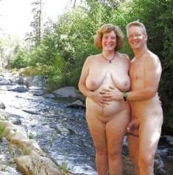 nudistlifestyle:  Mature nudist couple looking