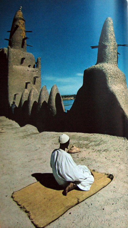 touba: “Far from his spiritual home, an African Muslim faces Mecca during prayer in Mopti, Mal