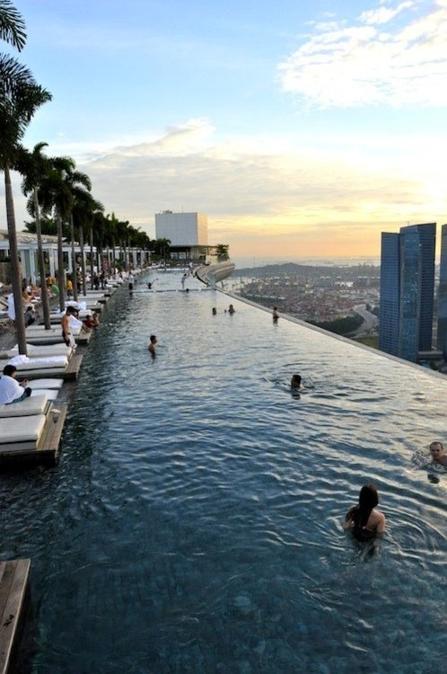 finnharries:  Where is this awesome place?! Update: Apparently it’s the sky pool in MBS hotel Singapore. Awesome!