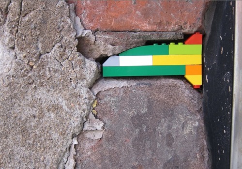 vengrove:  Lego to the rescue!  Creative street art as seen on www.streetartutopia.com. Now you can fix masonry problems yourself!