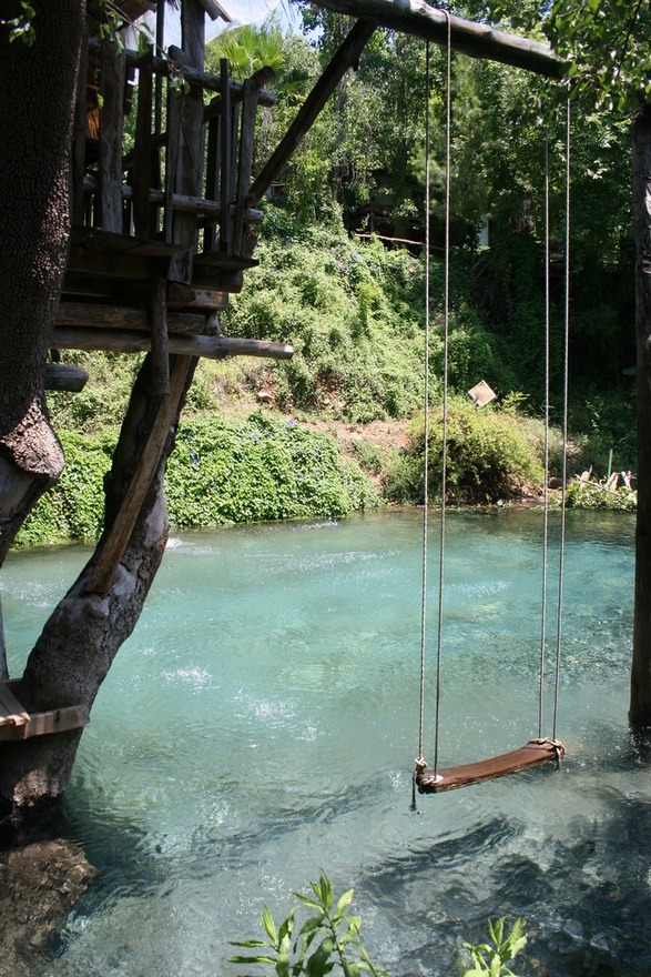      Swimming pool made to look like a river.     