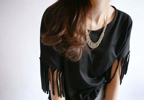 Fringe gold-tone necklace Look effortlessly girly and edgy in this luscious cascade of gold beads Me