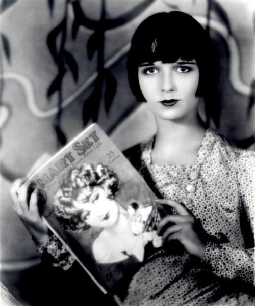 Louise Brooks Reading Smart Set. Photograph by Preston Duncan.A dancer and actress, Brooks (1906-198