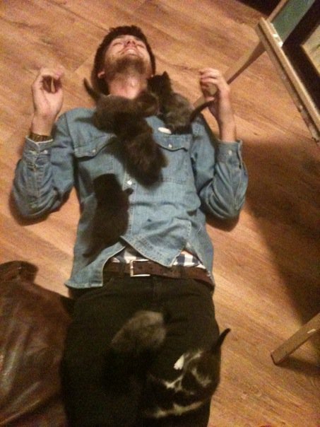 cuteboyswithcats:  photographer/bud andrew cottingham and a pile of kittens, yours