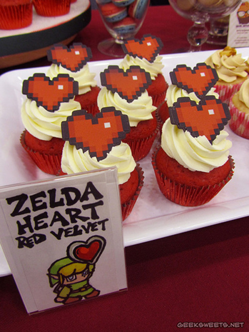 otlgaming:  SWEET HEART ZELDA CUPCAKES FOR YOUR SWEETHEART These Legend of Zelda heart container cupcakes are a visual delight.  I love everything from the basic design to the custom delivery box.  For a second helping of delicious video game desserts,try