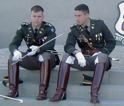 2manykinks:  White gloves, swords, sexy boots, and military uniforms. A gay guy MUST have come up with this look.